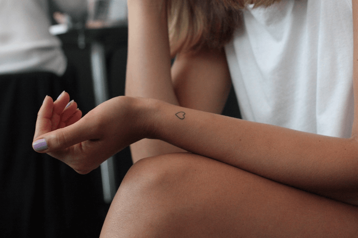 do poke tattoos last a long time - photo of girl with poke tattoo