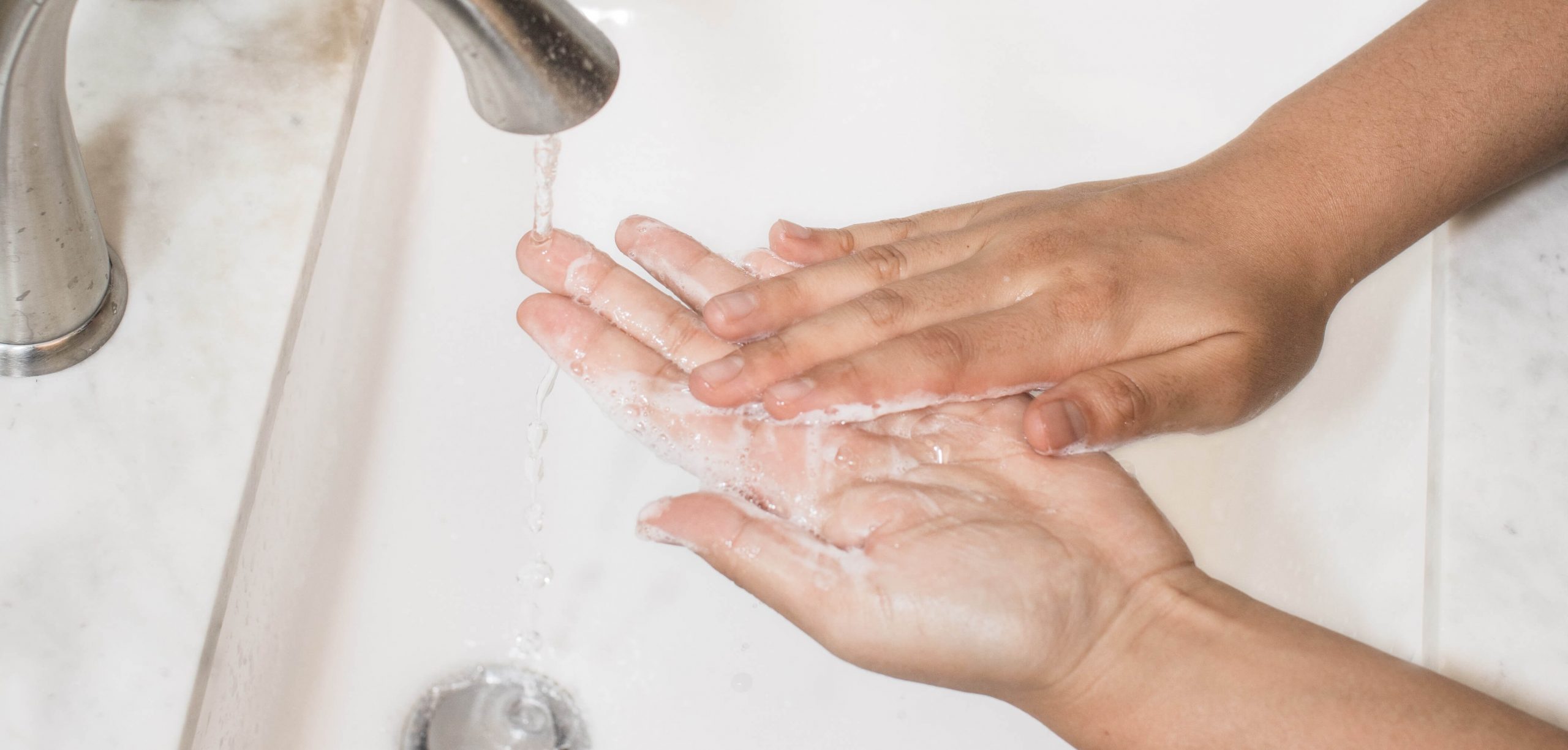 image shows person hand washing with the best tattoo soap around