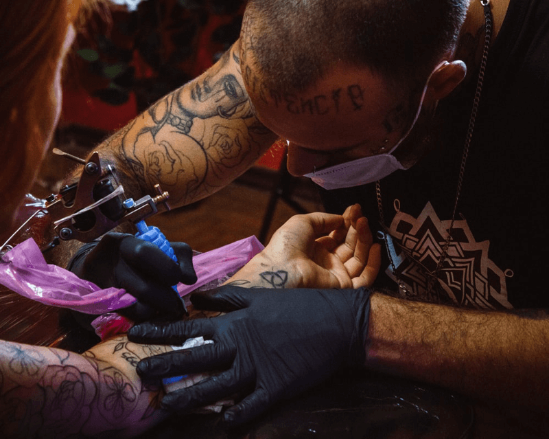 tattoo artist at work